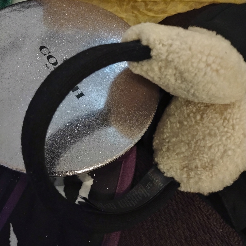 Cute Coach penguin ear muffs